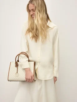 Torebka z dwoma uchwytami do ręki zdobiona monogramami