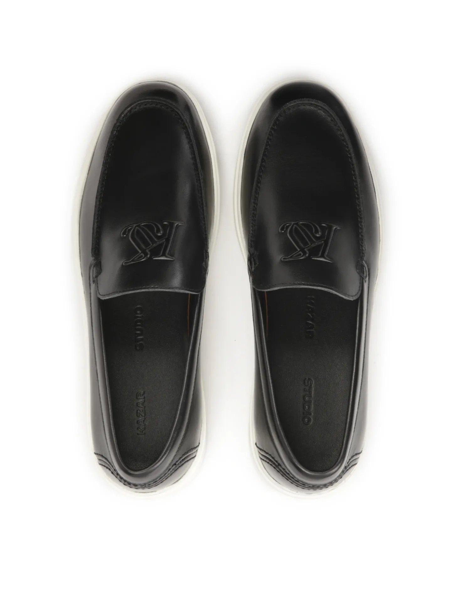 Wsuwane czarne loafersy z białą podeszwą typu sneakers